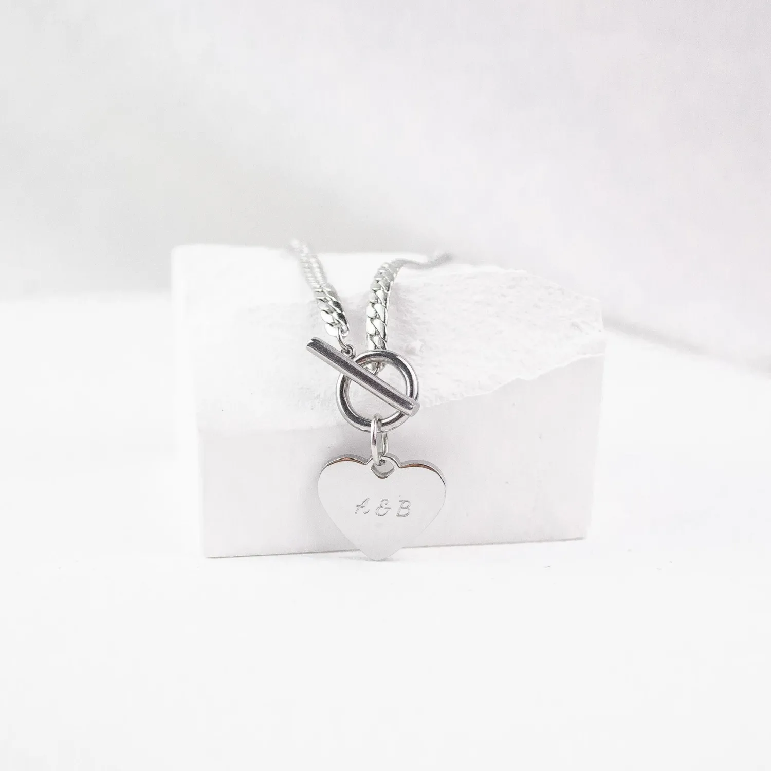 Statement Ketten | Hey Happiness Herz Kette mit T-Steg in Silberfarbe Silver